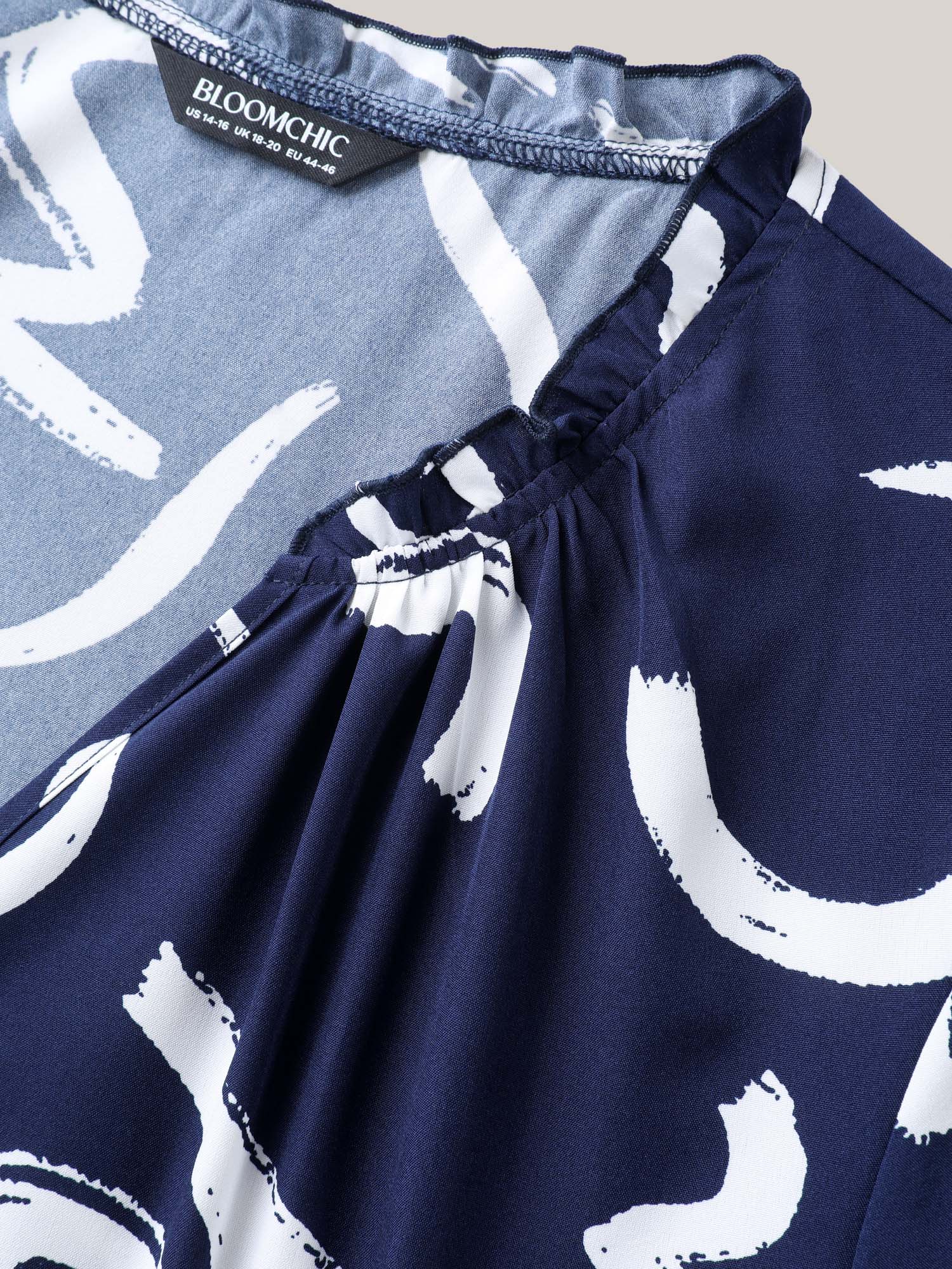 Scribble Print Ruffled Split Neck Blouse